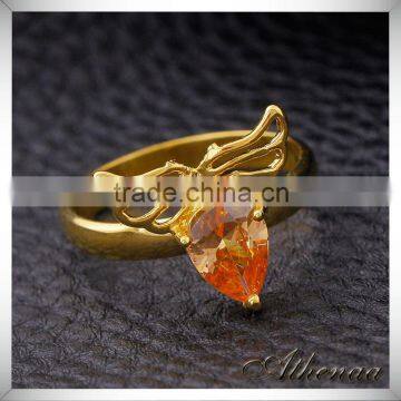 China Imported Jewelry Smooth Metal Angle Wing Red Zircon Gold Engagement Ring photo-3