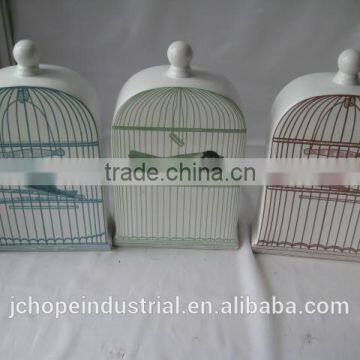 ceramic bird with cage decor