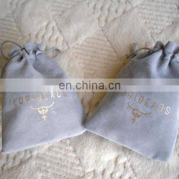 7.5*12cm Light grey velvet bag with Gold logo