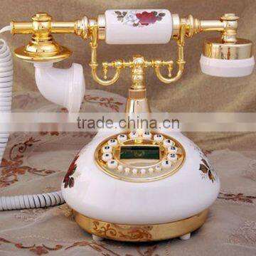 corded vintage porcelain telephone