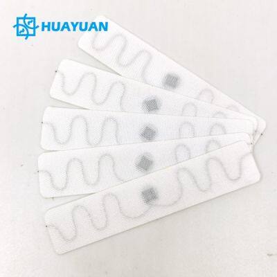 Textiles Linen Tracking Thermosticking Chip UHF Transponder RFID Laundry Tag