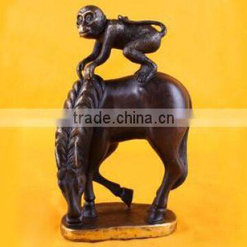 Bronze monkey on horse back lucky statue