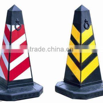 yellow and red plastic traffic road cone