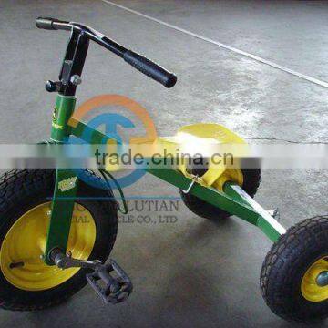 kids green tricycle