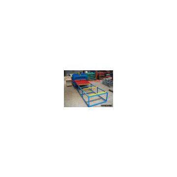 Roof tile forming machine