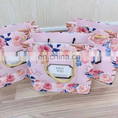 Wholesale custom pink marble bag packaging shopping paper bag with handles