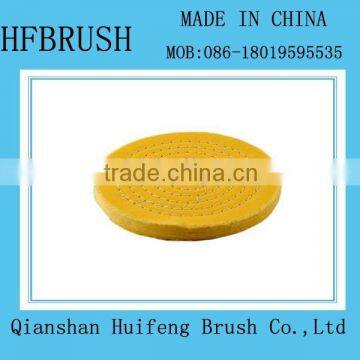 Yellow stiching buffing wheel