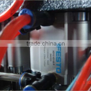 Automatic lineal PET blow moulding machine