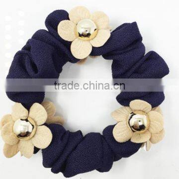 simple plain scrunchy with flower hair dressing