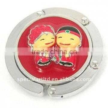 metal red foldable bag hanger with couple decoration for wedding gifts,weight capacity : 7kg