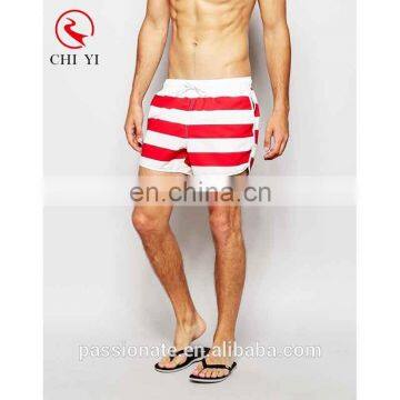 Manufacturer custom made oem beach wear mens board shorts printed surfing trunks