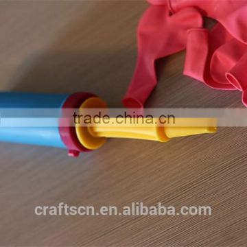 Small double action hand pump for balloons