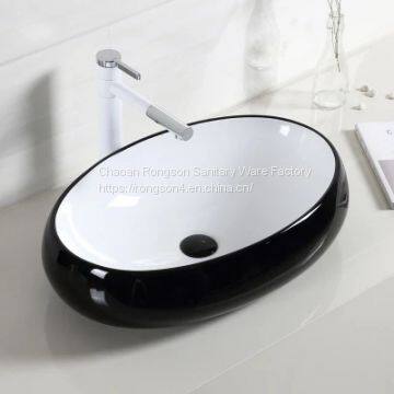 Modern black color ceramic oval table sink