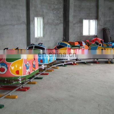 Cartoon theme portable fiberglass track train ride for kids