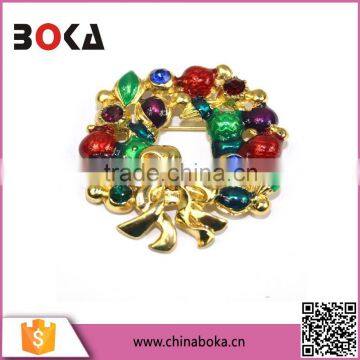 BOKA tuzzy-muzzy Christmas wreath gold enamel brooch