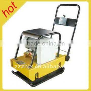 Hand electric reversible plate compactor