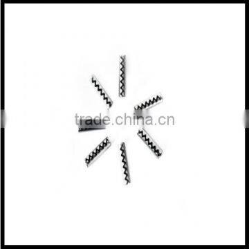Saw tooth coiled pins
