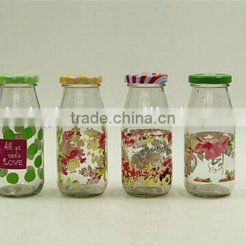 Round glass milk beverage bottle with decorative printing 200ml