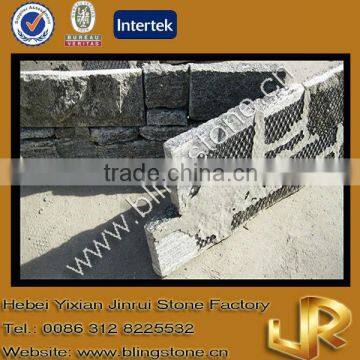 Grey granite mesh backed external wall stones