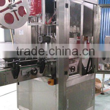 Automatic plastic bottle shrink sleeve labeling machine