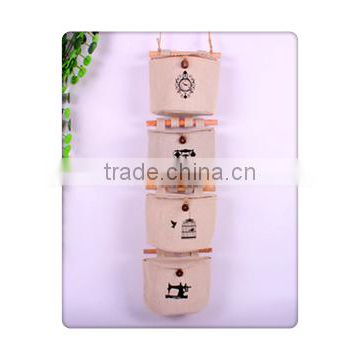 wholesale cotton four semicircular hanging bag with natural wood stick ,and with picture as show