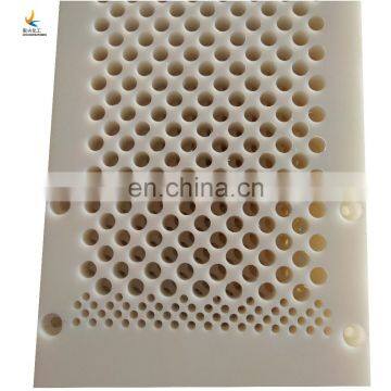 Ultra-low friction abrasion resistant vacuum suction box cover for paper machine