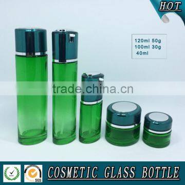 Green colored glass pump lotion bottle and cosmetic glass cream jar