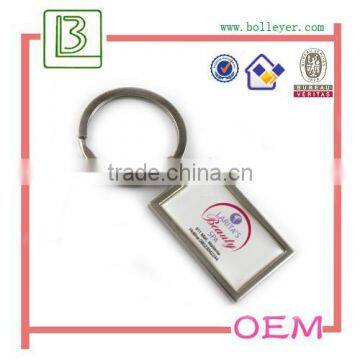 rectangle shape metal keychain with Epoxy domed custom logo