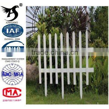 White PVC picket fence