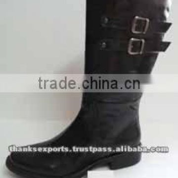 Half chaps worn over paddock boots duplicate the protection and visual line of a tall boot