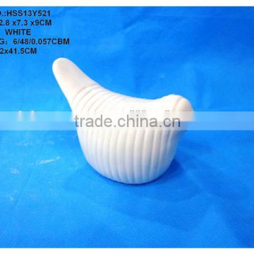 white bird figurine in white bird decoration