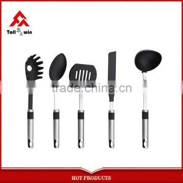 Cooking utensil with metal holder with kitchen tools set