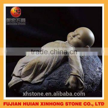 Lovely shaolin little monk buddha statue sleep on stone