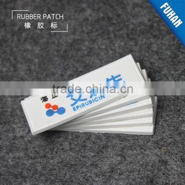 Embossed Custom White Background PVC Rubber Patch Logo photo-6