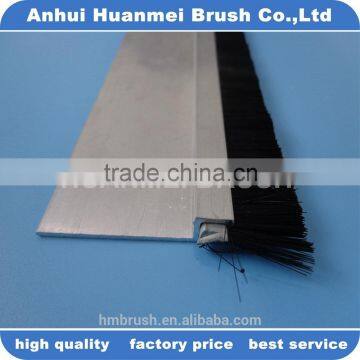 Door seal brush strip and flexible strip brush