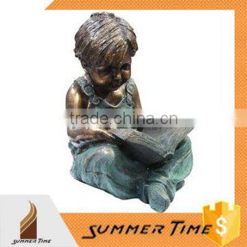 reading book boy bronze sculpture