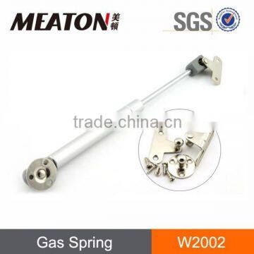 Furniture cabinet supporting gas spring