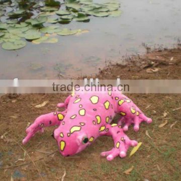 Realistic plush toy frog with spots