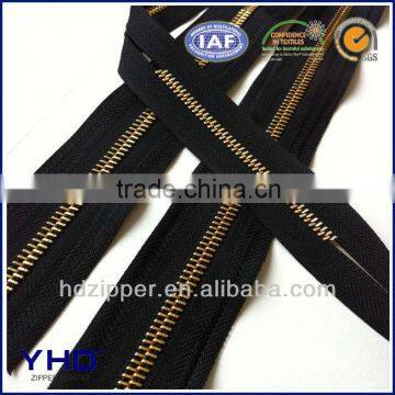 golden teeth metal zipper roll