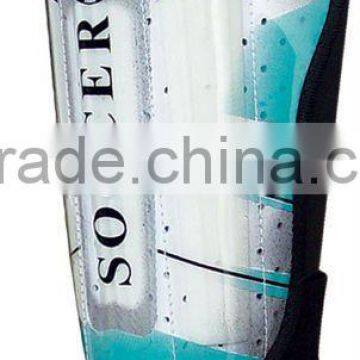 Soccer shin guard with instep