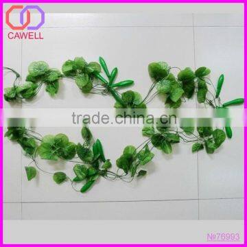 plastic artificial cucumber string with green leaves