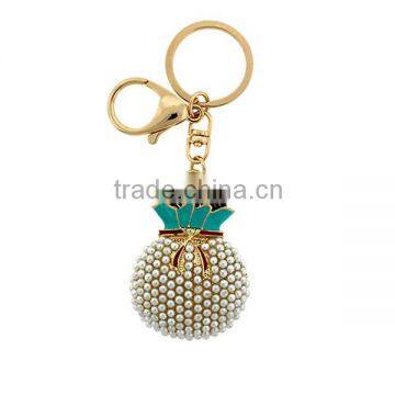 Heart money bag gold pearl keychain