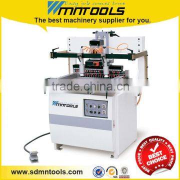 Multiple spindle boring machine for furniture production