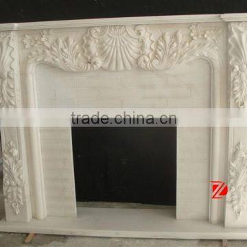 Indoor white marble fireplace mantel