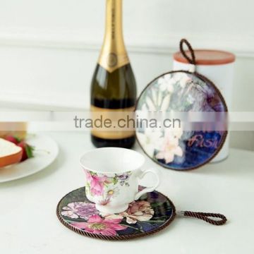 Hot sell round shape ceramic trivet with rope for hanging