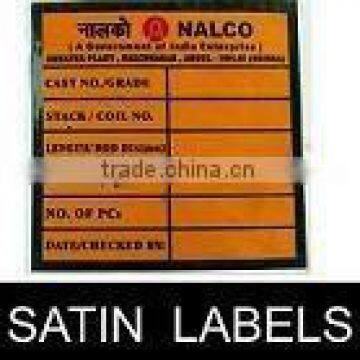 Cloth / Satin Self Adhesive Labels.