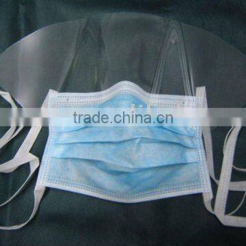 Non-woven face mask with eye shield and tie on