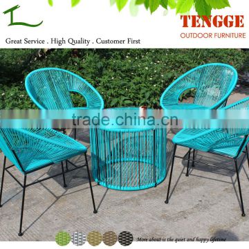 Turquoise color small round rattan acapulco chair and table