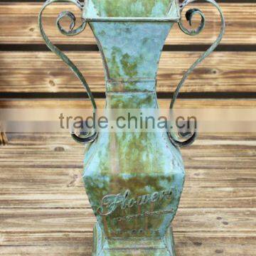 Large decorative painted metal flower vase