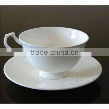 porcelain/ceramic tea cup and saucer